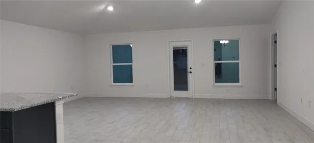 an empty room with window