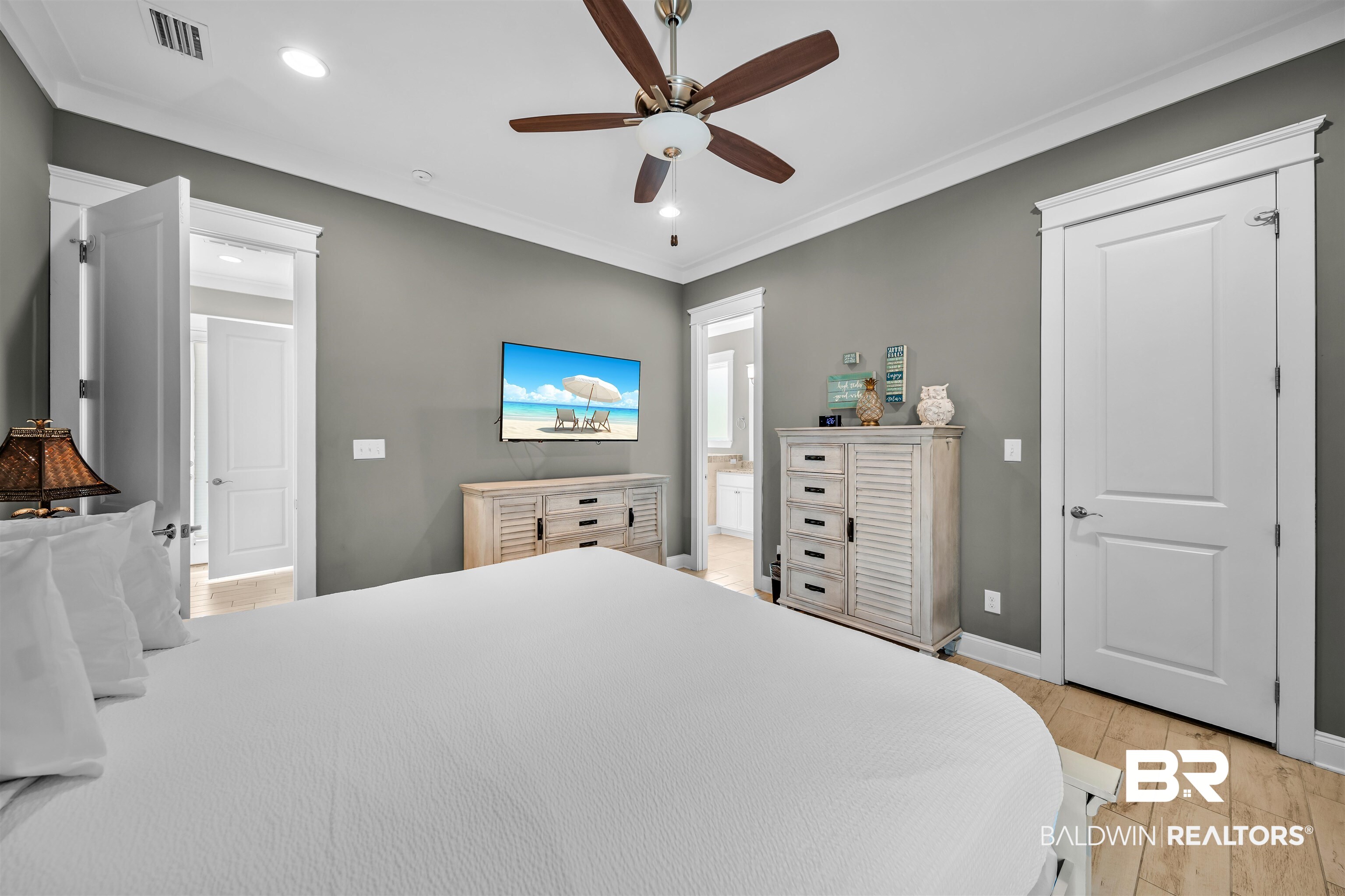 47 Parks Edge Orange Beach, AL 36561 - Photo 10 of 40 Bedroom with crown molding, light wood-type flooring, recessed lighting, a ceiling fan, and ensuite bathroom
