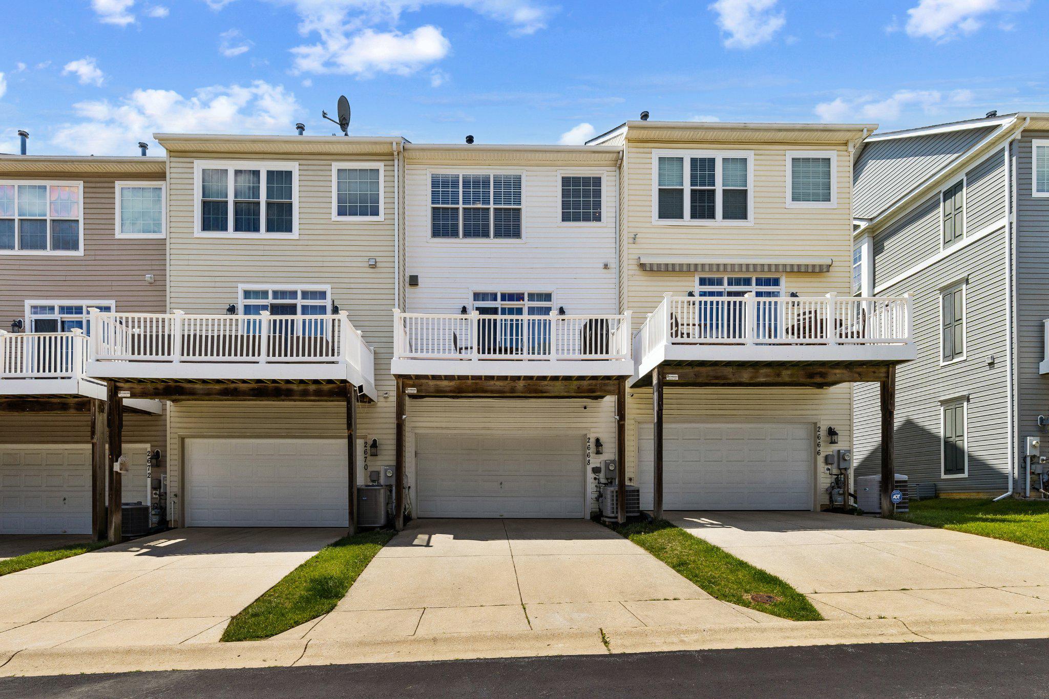 2668 Merlin Court Odenton, MD 21113 - Photo 30 of 42 a view of a white building with many windows