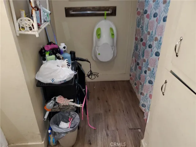 a view of entryway with wooden floor