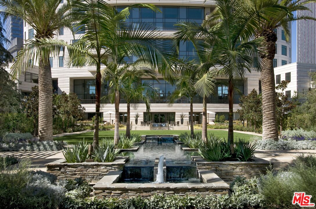 1 West Century Drive, Unit PH 38B Los Angeles, CA 90067 - Photo 3 of 5 a front view of a house with a yard