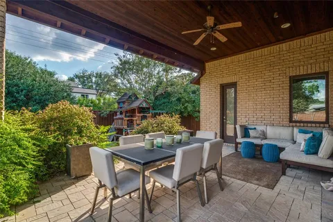 a dining room with furniture and outdoor space