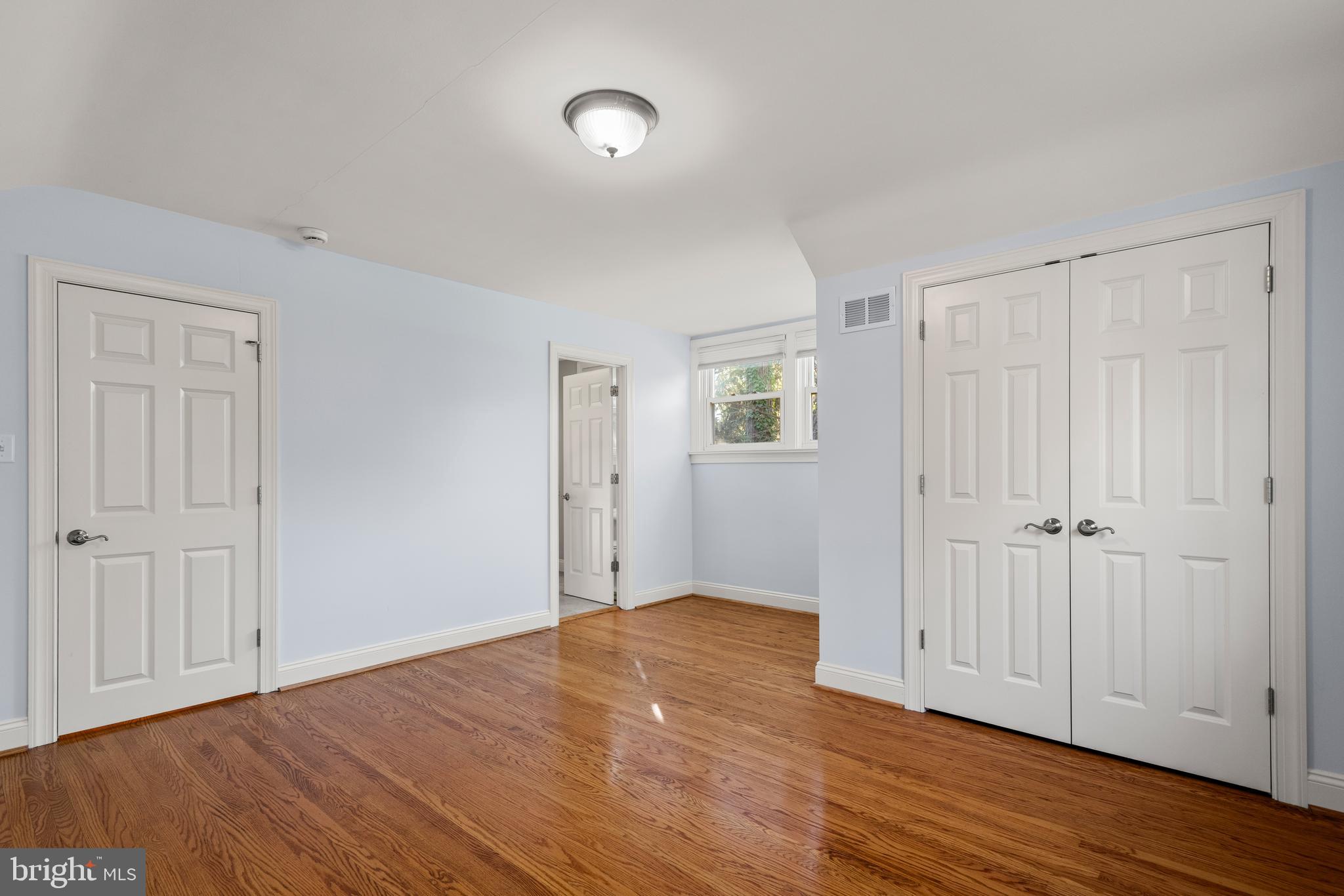 1040 Great Springs Road Bryn Mawr, PA 19010 - Photo 36 of 50 a view of an empty room with wooden floor