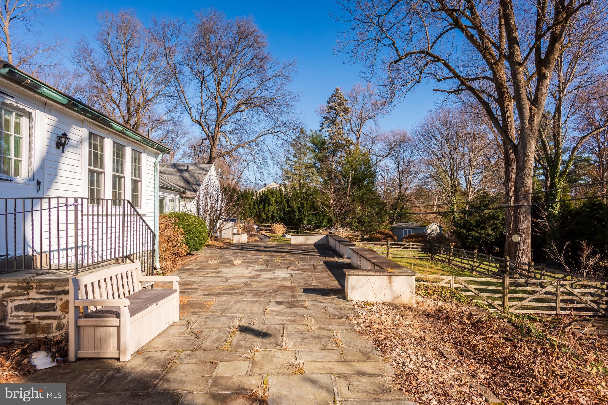 1040 Great Springs Road Bryn Mawr, PA 19010 - Photo 44 of 50 a view of a patio with a yard