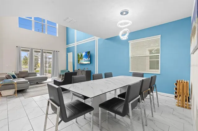 a view of a dining room with furniture