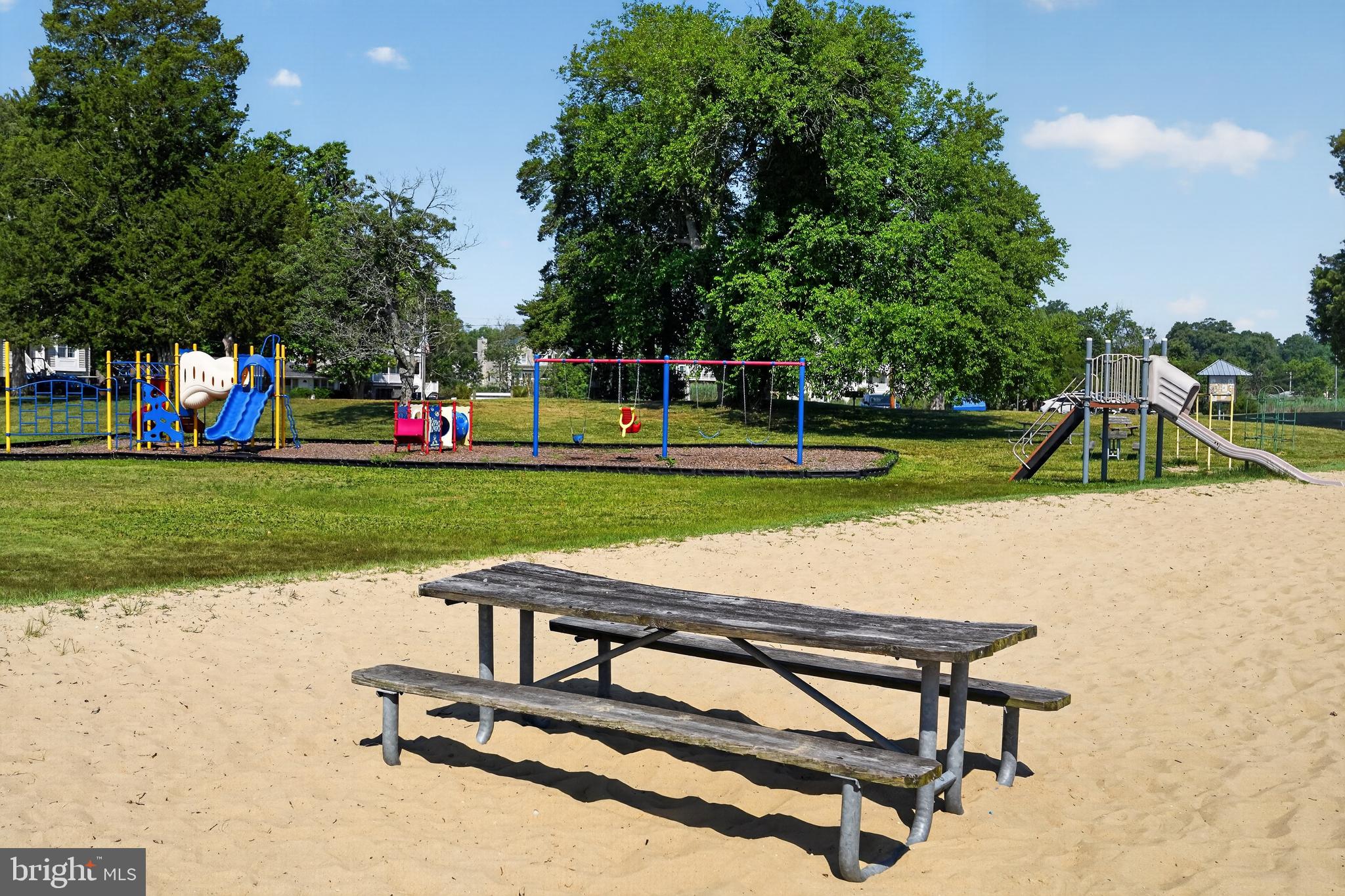 3670 5th Avenue Edgewater, MD 21037 - Photo 56 of 60 a view of a park with swings and slides
