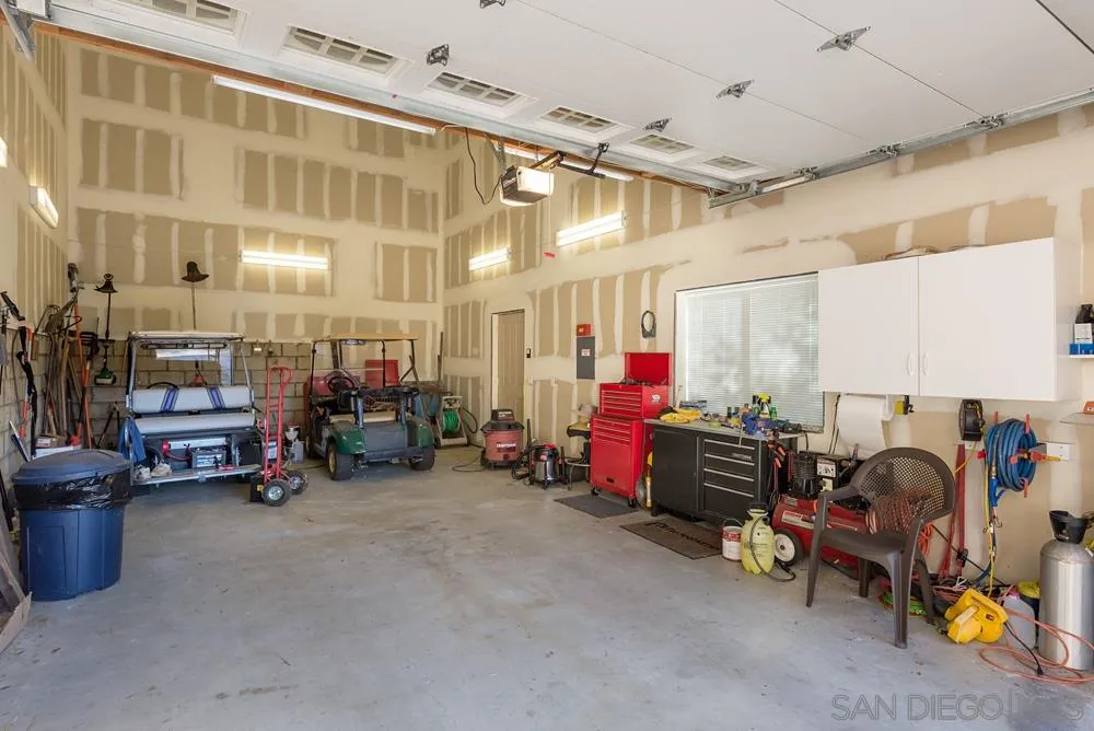 1295 Banner Road Julian, CA 92036 - Photo 20 of 25 a living room with lots of furniture and a chandelier