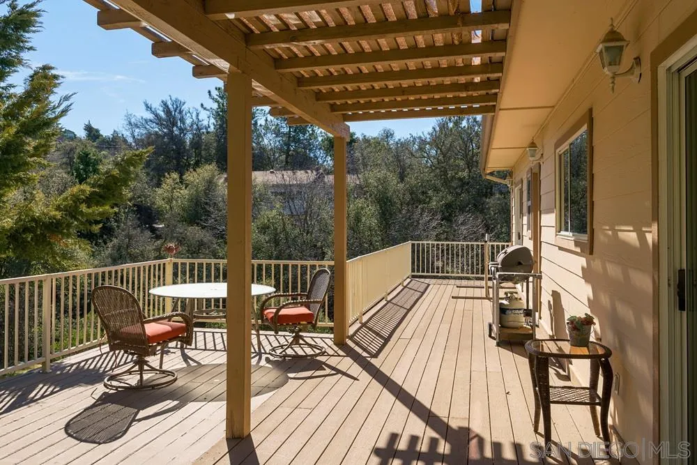 1295 Banner Road Julian, CA 92036 - Photo 22 of 25 a view of balcony with wooden floor and outdoor seating