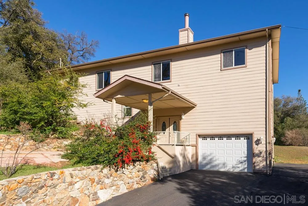 1295 Banner Road Julian, CA 92036 - Photo 5 of 25 a front view of a house with garden