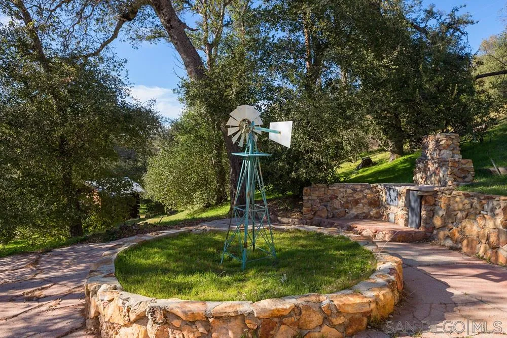 1295 Banner Road Julian, CA 92036 - Photo 6 of 25 a swimming pool with trees in the background