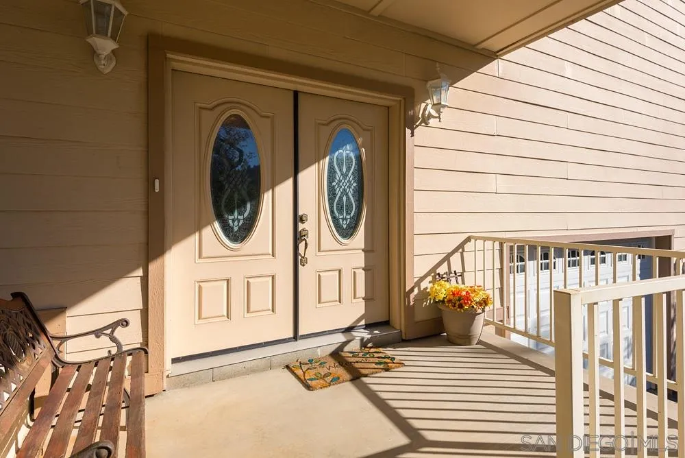 1295 Banner Road Julian, CA 92036 - Photo 7 of 25 a view of a door of the house with wooden fence