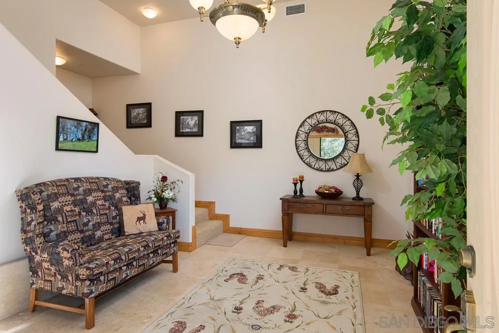 1295 Banner Road Julian, CA 92036 - Photo 8 of 25 a living room with furniture and a fish tank