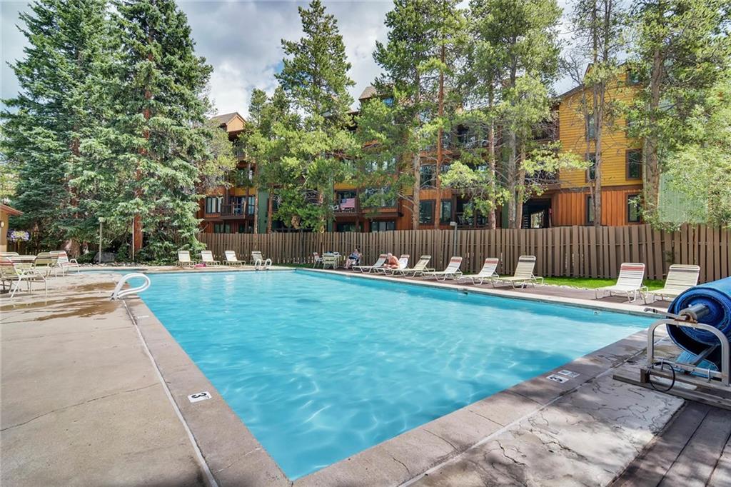 800 Columbine Road, Unit B9 Breckenridge, CO 80424 - Photo 22 of 25 a view of a backyard with a patio