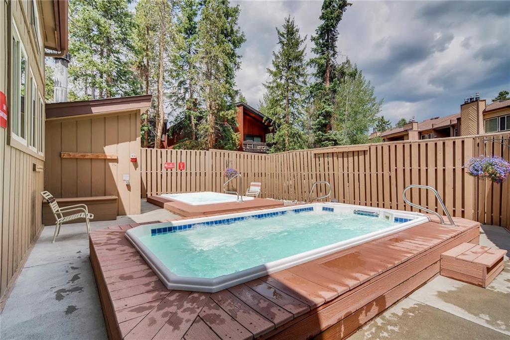 800 Columbine Road, Unit B9 Breckenridge, CO 80424 - Photo 23 of 25 a view of a wooden deck with furniture