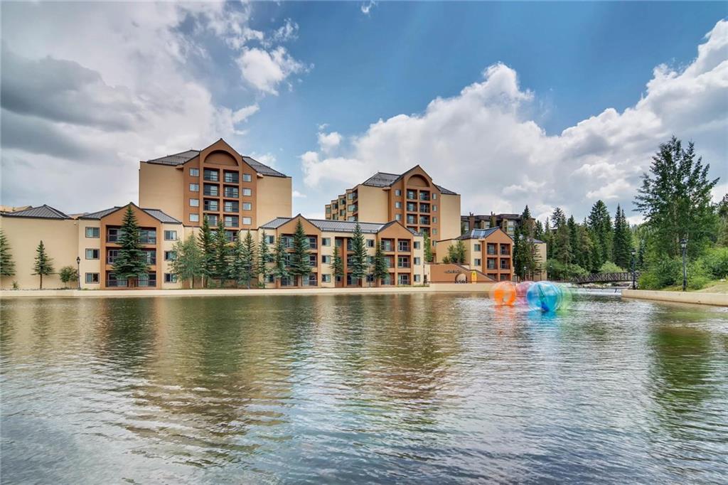 800 Columbine Road, Unit B9 Breckenridge, CO 80424 - Photo 24 of 25 a view of a lake with houses