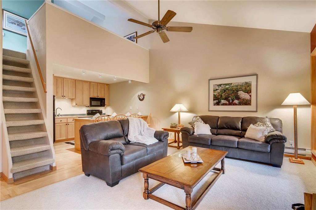 800 Columbine Road, Unit B9 Breckenridge, CO 80424 - Photo 4 of 25 a living room with furniture kitchen view and a window