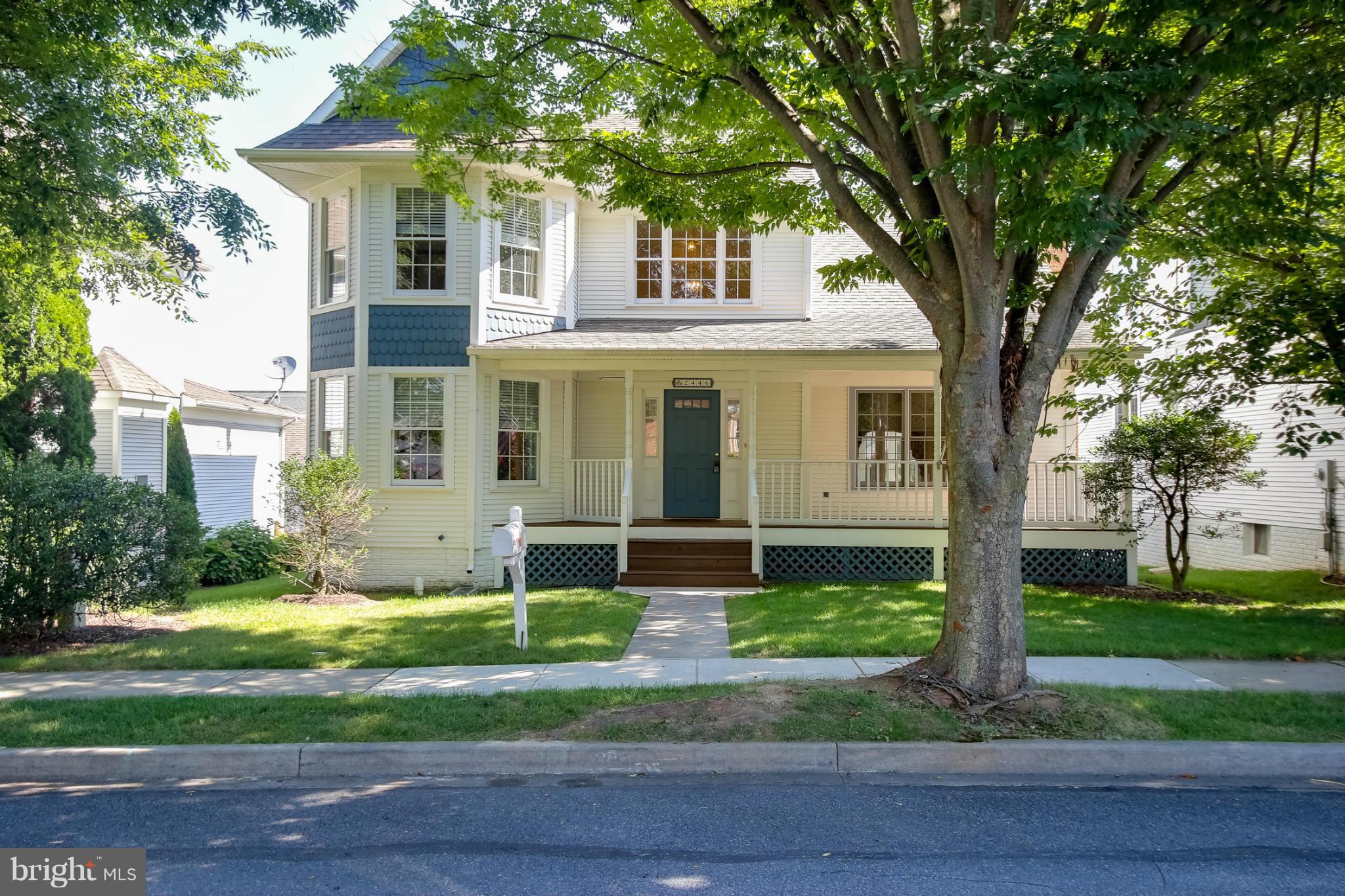 2446 Five Shillings Road Frederick, MD 21701 - Photo 1 of 30 a front view of a house with garden