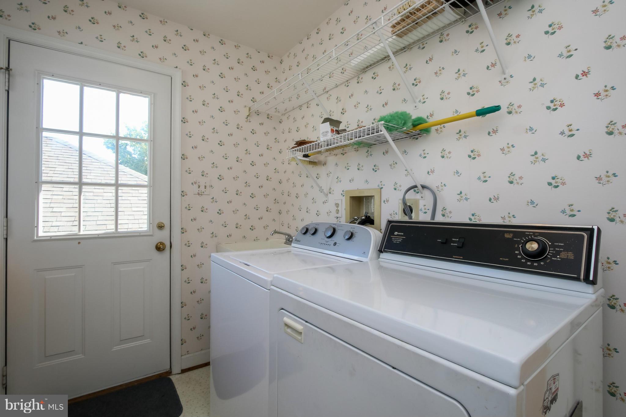 2446 Five Shillings Road Frederick, MD 21701 - Photo 16 of 30 a utility room with dryer and washer