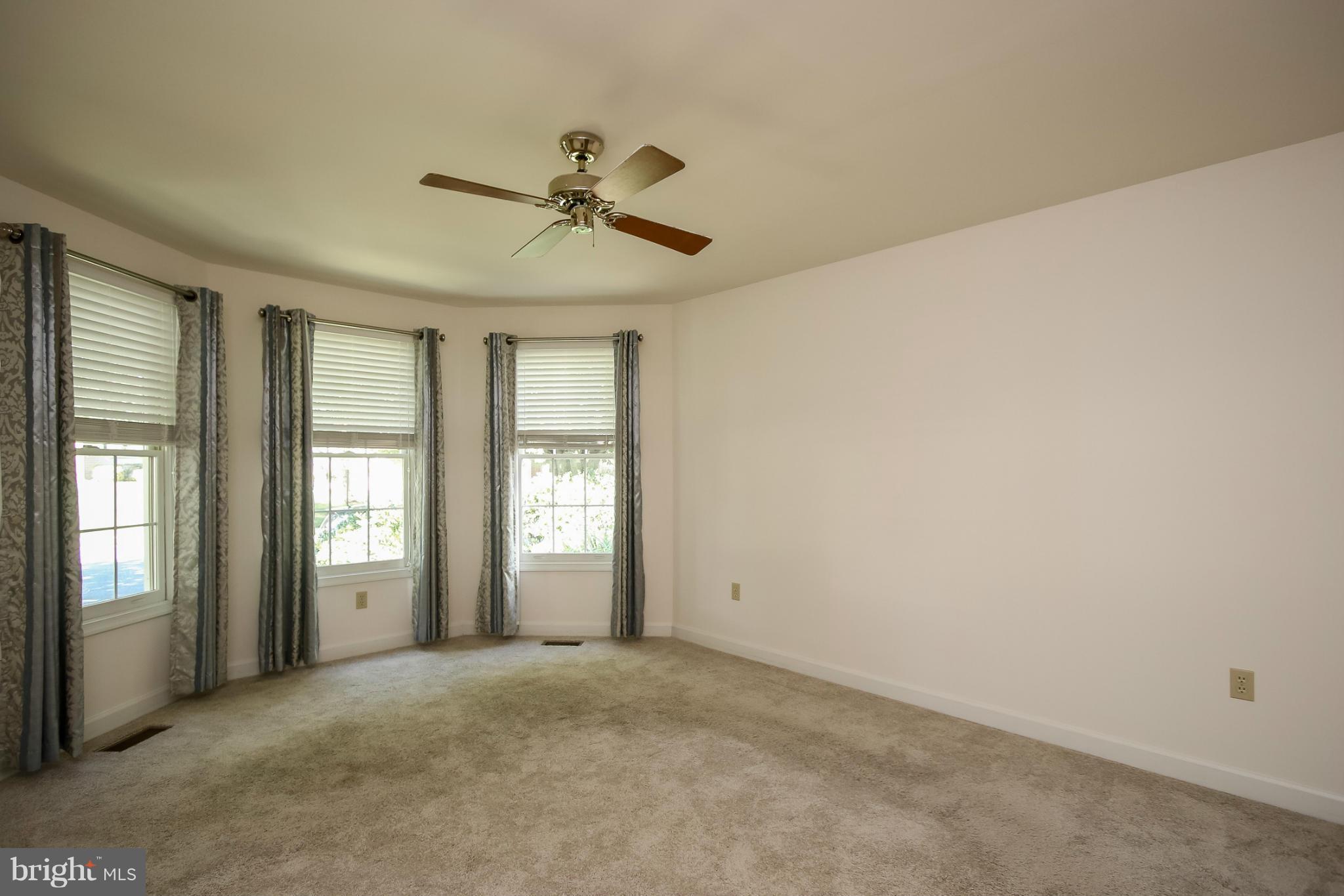 2446 Five Shillings Road Frederick, MD 21701 - Photo 17 of 30 a view of an empty room with a window