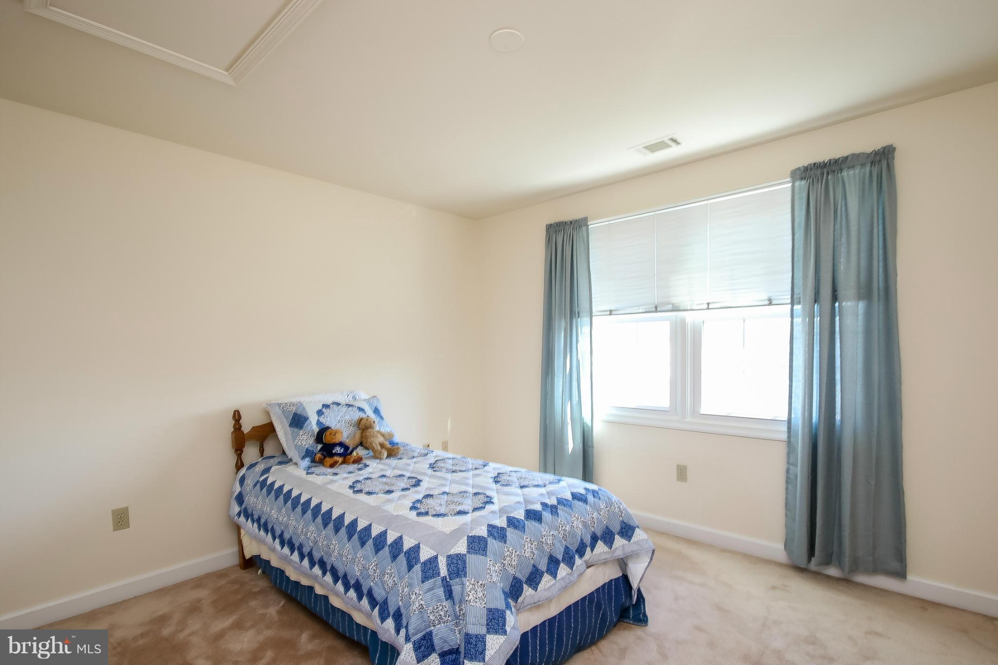2446 Five Shillings Road Frederick, MD 21701 - Photo 23 of 30 a bedroom with a bed and a window