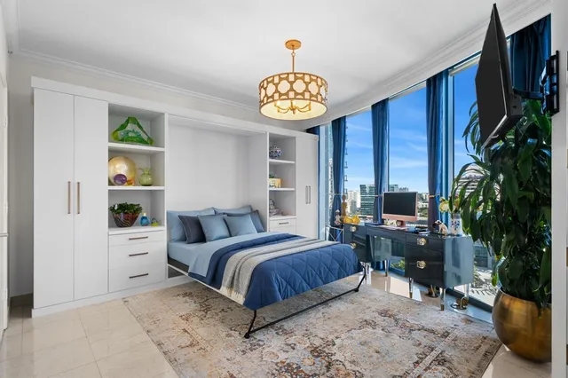 a view of an entryway with a table and chairs