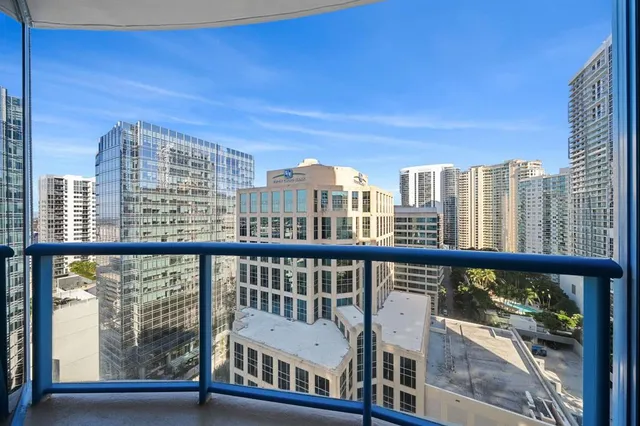 a view of a city with tall buildings