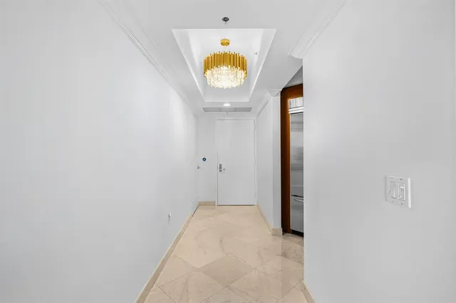 a kitchen with stainless steel appliances granite countertop a sink and a stove