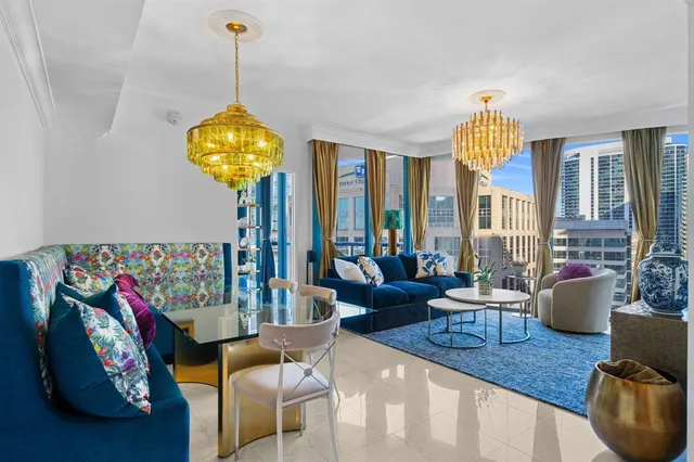 a living room with dining table