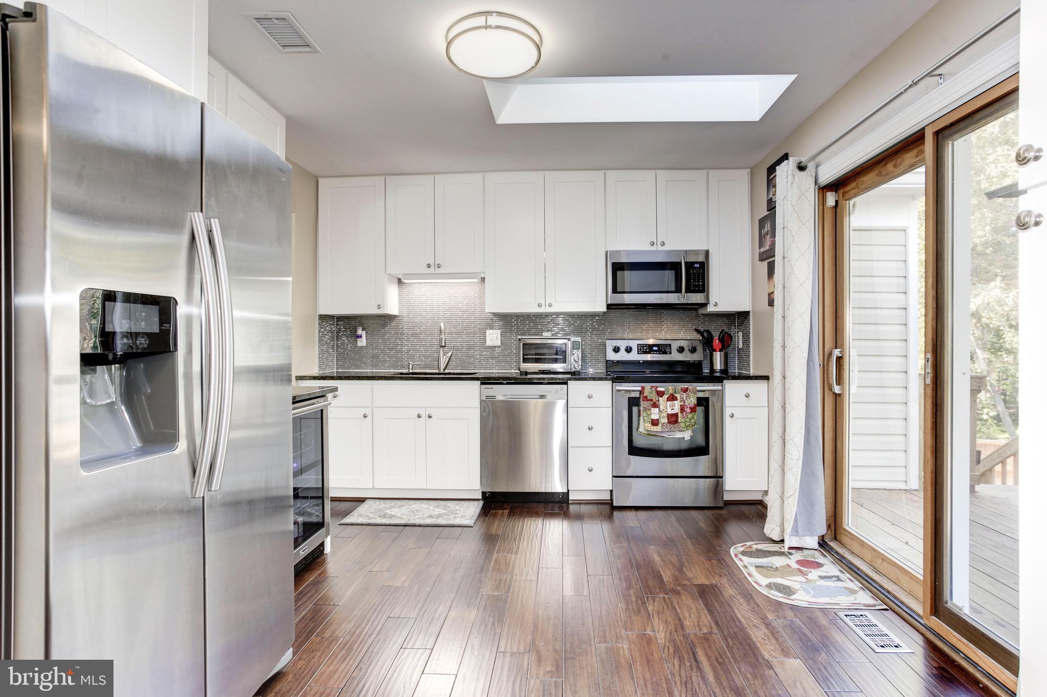 9010 Triple Ridge Road Fairfax Station, VA 22039 - Photo 14 of 59 Upgraded Kitchen with Access to Deck