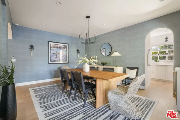 a kitchen with a sink cabinets and window
