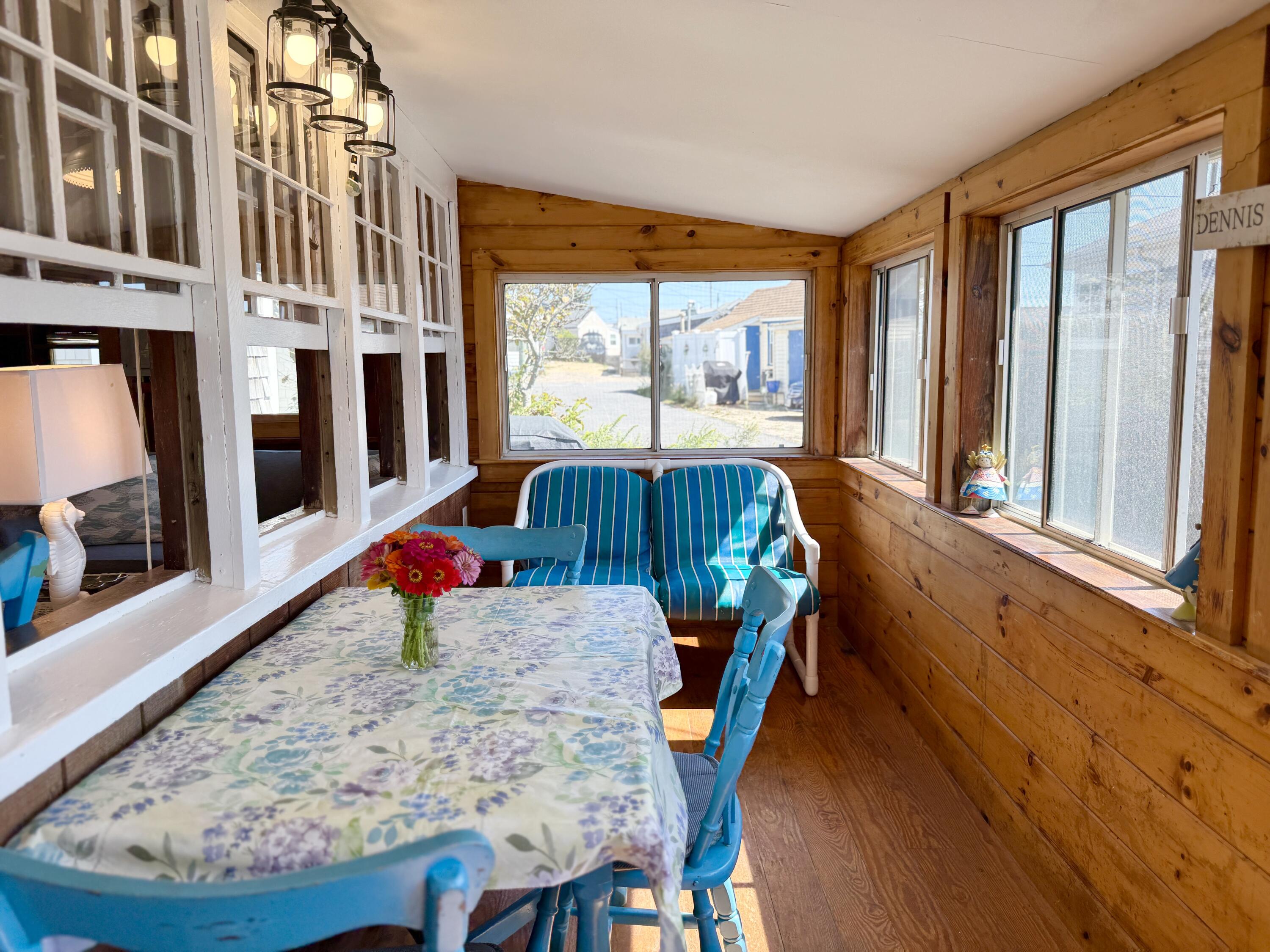 217 Old Wharf Road, Unit 64 Dennis Port, MA 02639 - Photo 7 of 25 a view of a living room and dining room