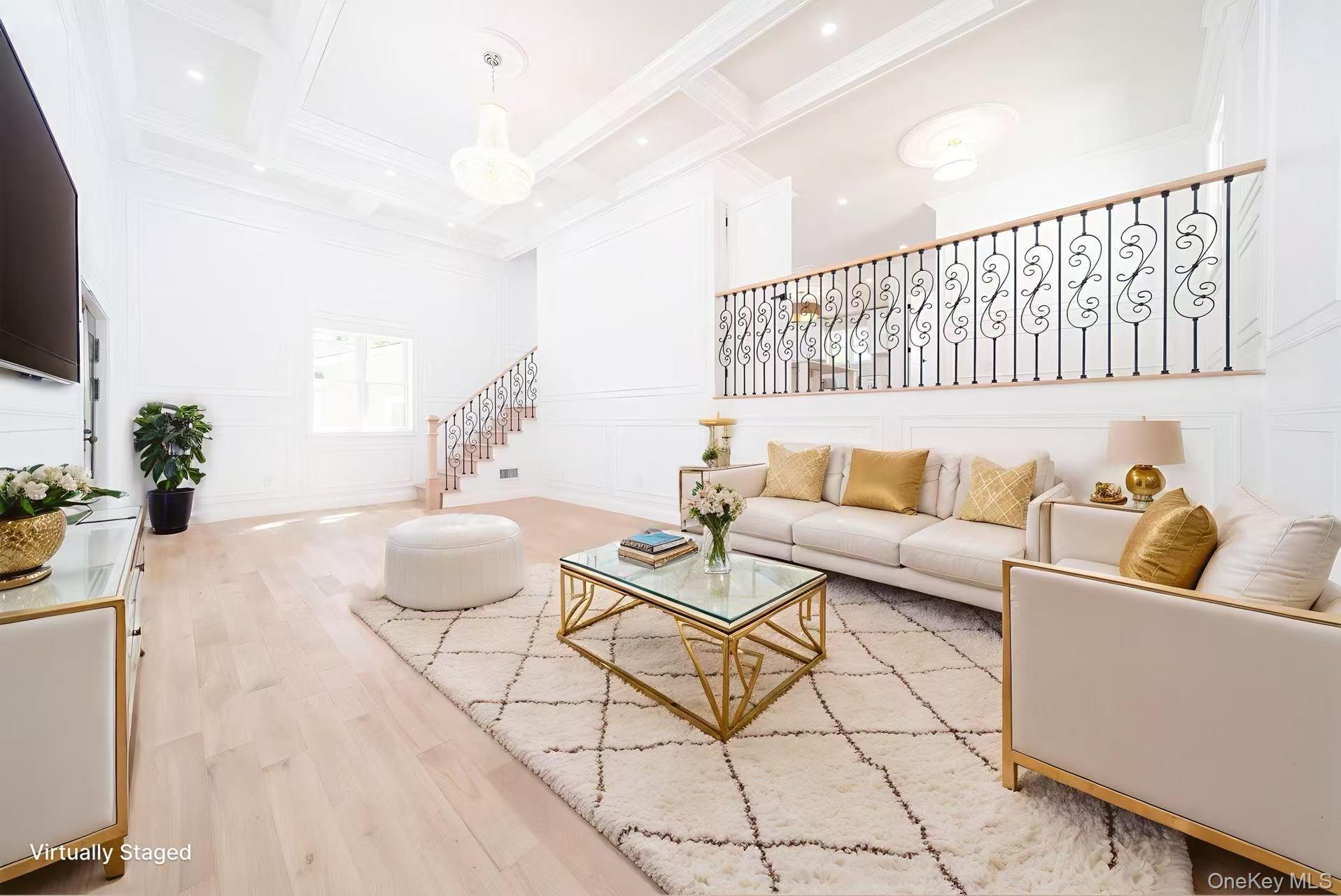 7-24 128th Street Queens, NY 11356 - Photo 3 of 31 Living area with stairs, a decorative wall, wood finished floors, beam ceiling, and coffered ceiling
