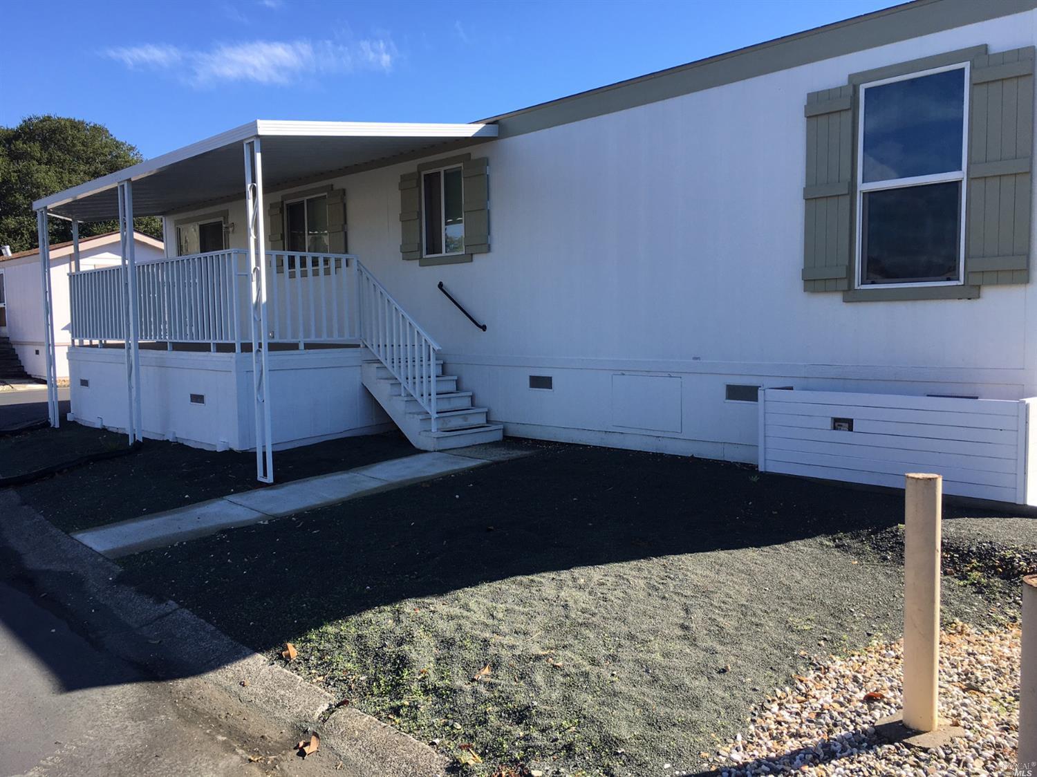 a view of a backyard of a house