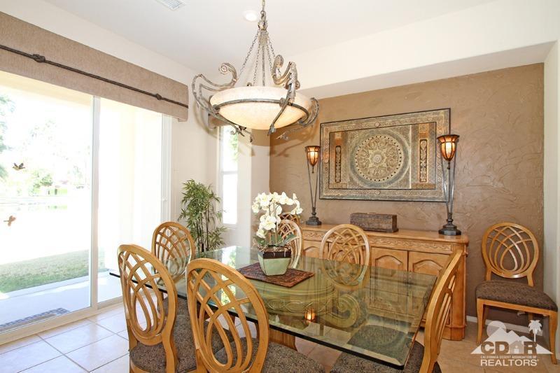 7 Wimbledon Circle Rancho Mirage, CA 92270 - Photo 15 of 46 a view of a dining room with furniture window and outside view