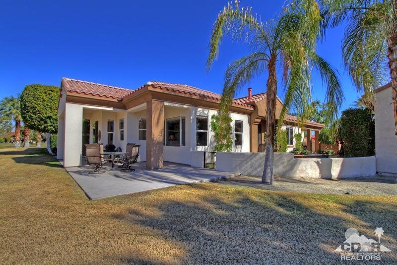 7 Wimbledon Circle Rancho Mirage, CA 92270 - Photo 2 of 46 a view of a house with patio and swimming pool