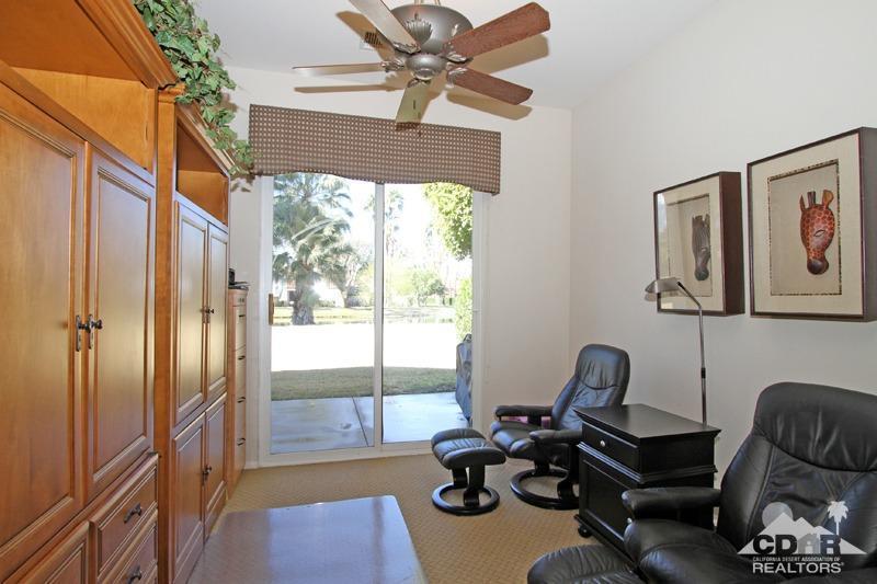 7 Wimbledon Circle Rancho Mirage, CA 92270 - Photo 21 of 46 a view of a livingroom with workspace and a window