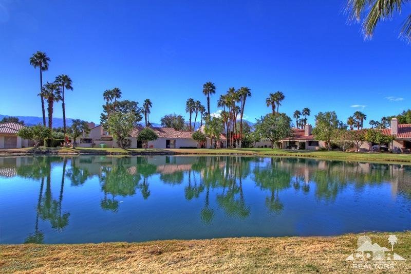 7 Wimbledon Circle Rancho Mirage, CA 92270 - Photo 3 of 46 a view of a lake with a house