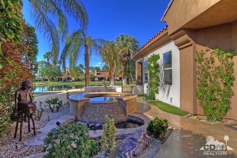 7 Wimbledon Circle Rancho Mirage, CA 92270 - Photo 38 of 46 a view of a house with a yard and sitting area