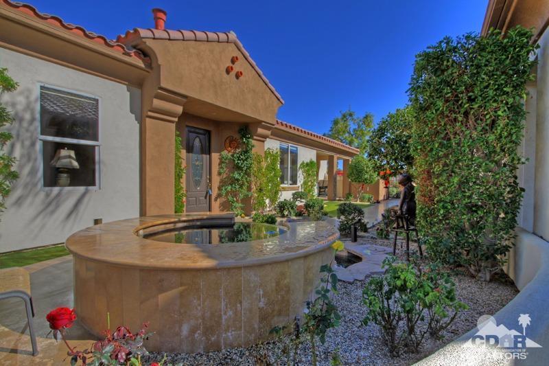 7 Wimbledon Circle Rancho Mirage, CA 92270 - Photo 4 of 46 a view of house with outdoor seating