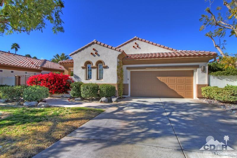 7 Wimbledon Circle Rancho Mirage, CA 92270 - Photo 6 of 46 a front view of a house with a yard
