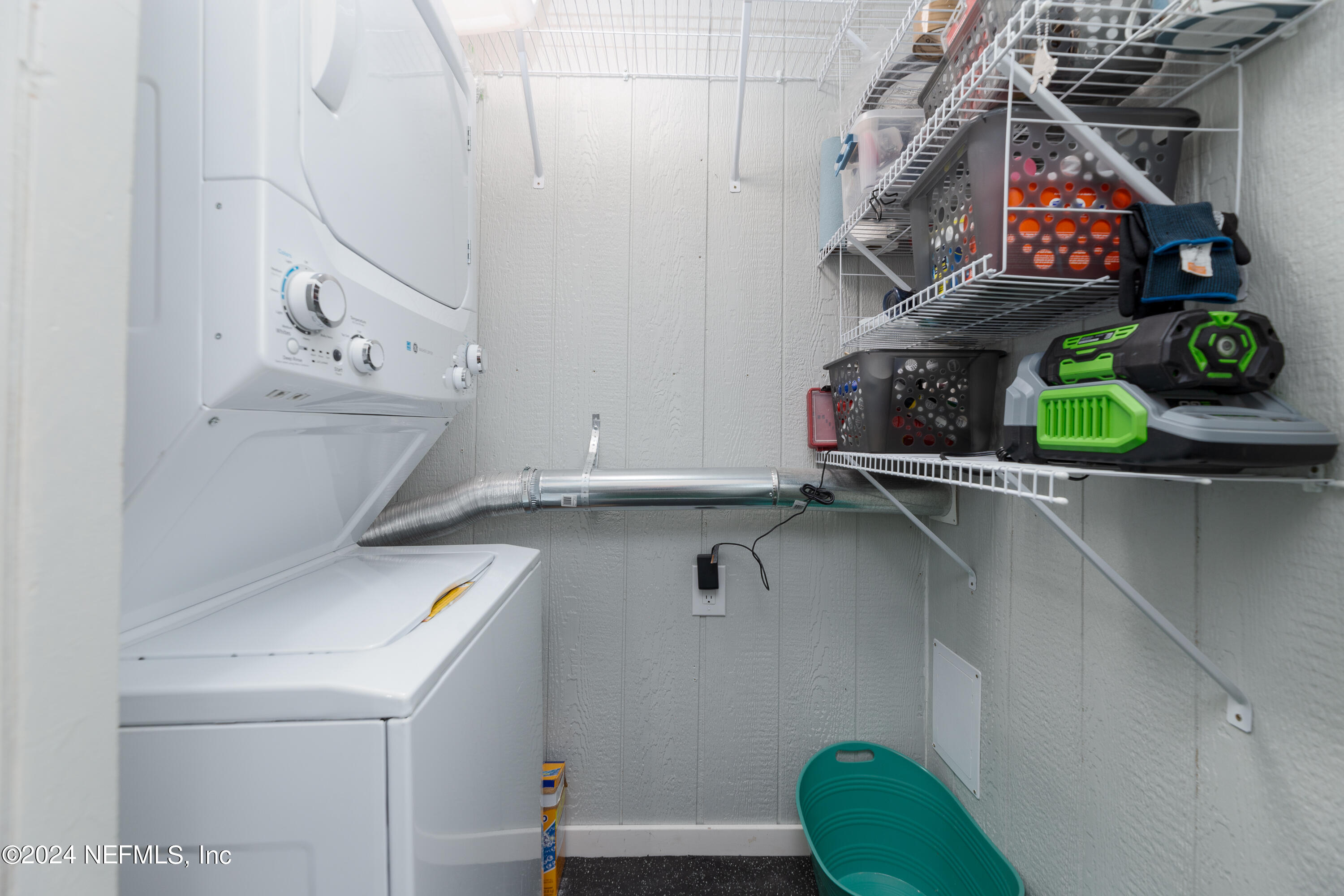 824 Cavalla Road Atlantic Beach, FL 32233 - Photo 12 of 18 a room with multiple dryer and washer