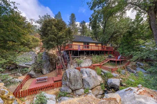 a view of a chairs and tables in the patio