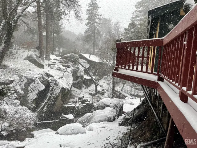 a view of a wooden street from a balcony