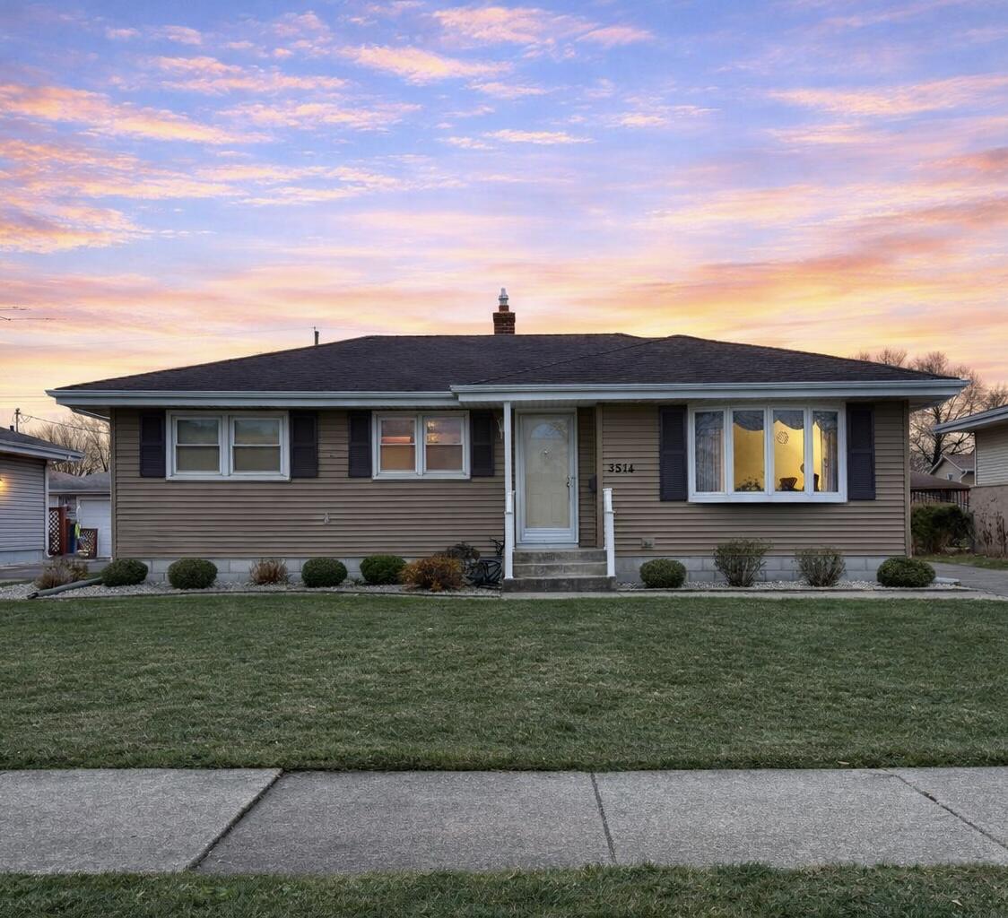 3514 41st Place Highland, IN 46322 - Photo 1 of 26 a front view of a house with a yard