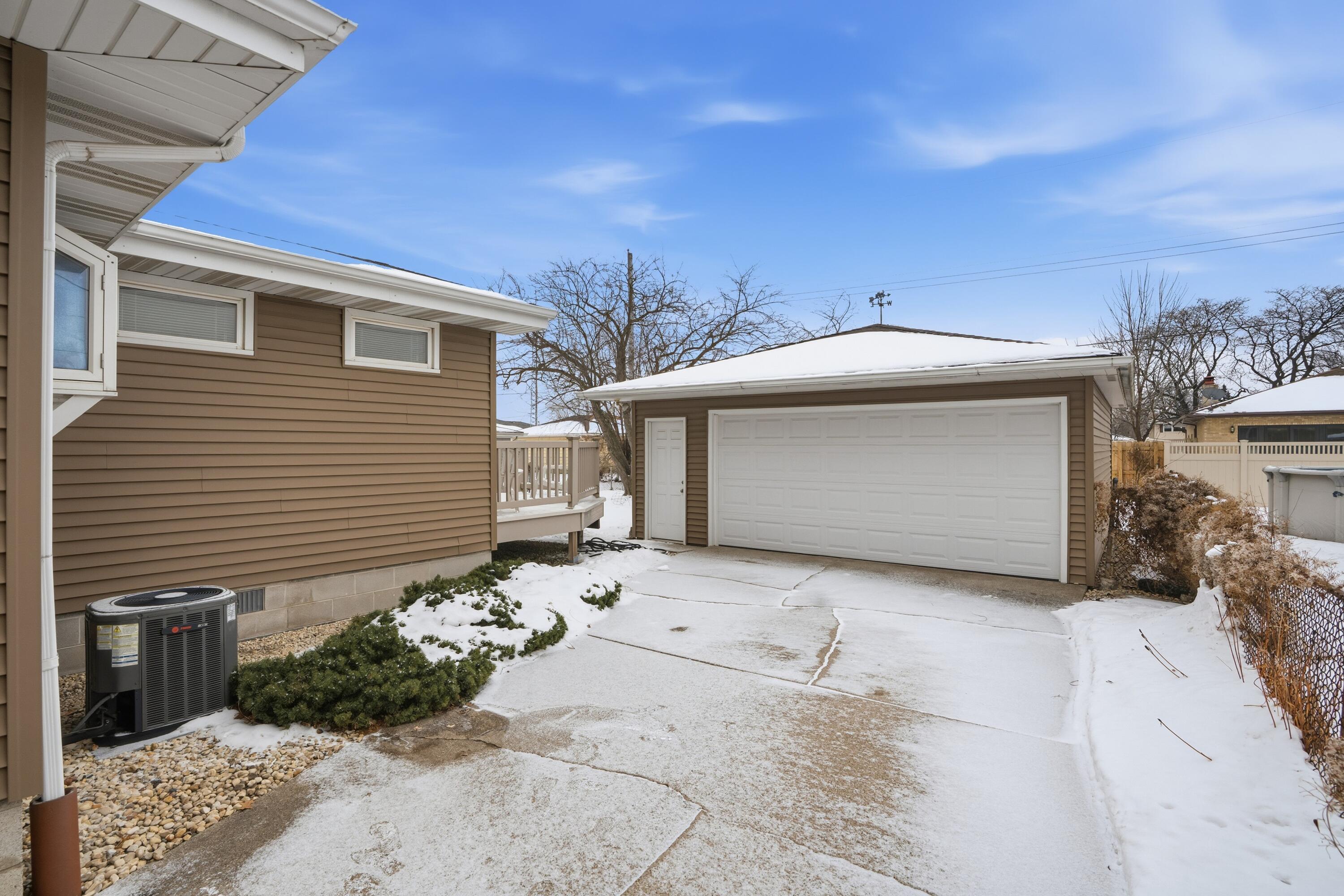 3514 41st Place Highland, IN 46322 - Photo 24 of 26 a front view of a house with a garage