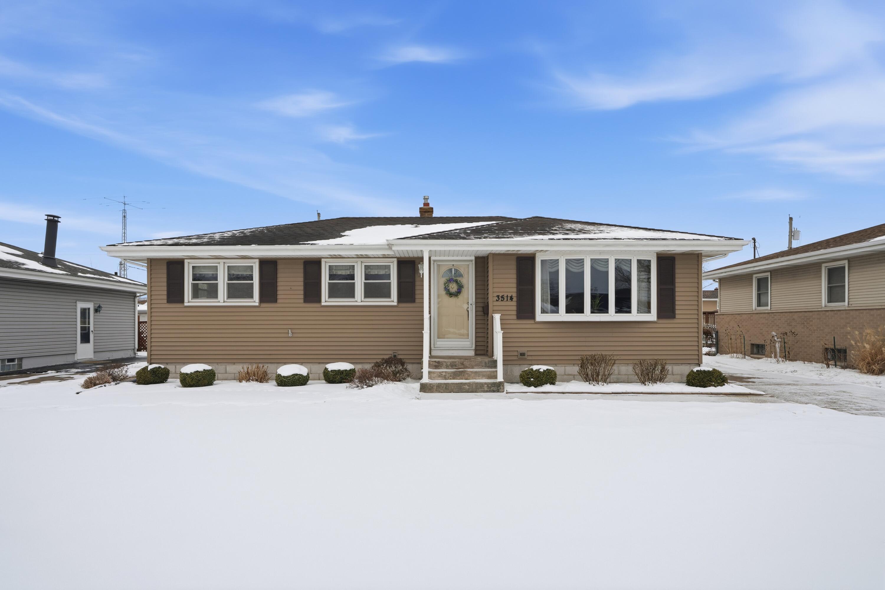 3514 41st Place Highland, IN 46322 - Photo 25 of 26 a front view of a house with a yard