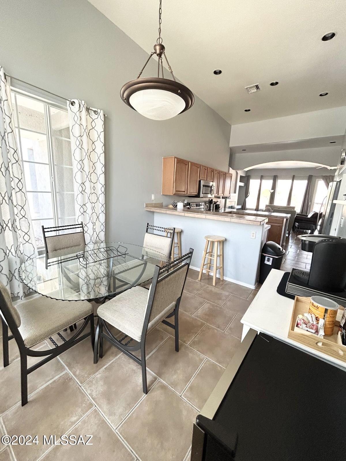 195 Ver Patria Rio Rico, AZ 85648 - Photo 5 of 17 a living room with furniture and a window