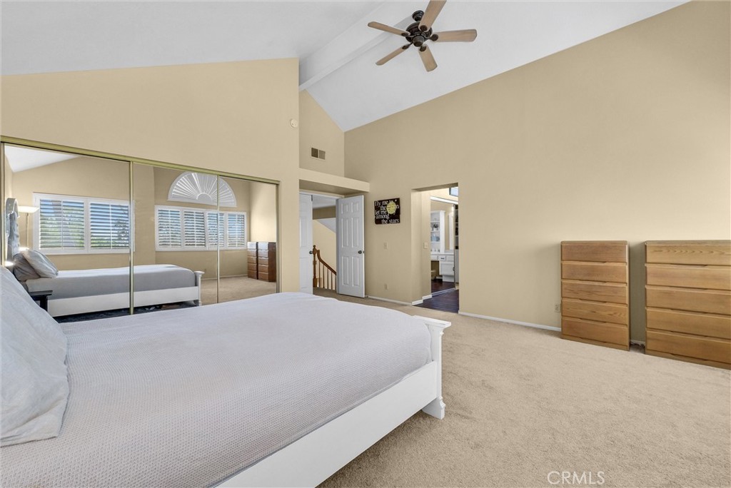 17358 Cold Spring Circle Riverside, CA 92503 - Photo 17 of 34 a bedroom with a bed and large mirror