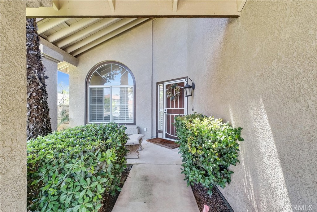 17358 Cold Spring Circle Riverside, CA 92503 - Photo 2 of 34 a front view of a house with garden