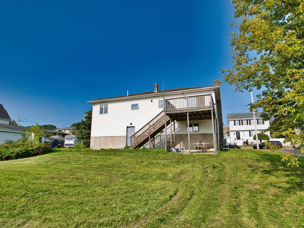 170 Nelson Street Fall River, MA 02721 - Photo 11 of 42 a view of a house with a yard
